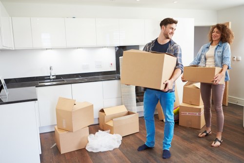 Careful furniture transport during a Canary Wharf flat relocation