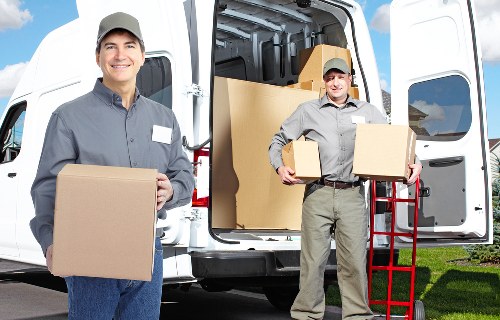 Boxes and furniture prepared for removals in Canary Wharf